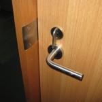 Office door with Schlage Danmark lever and extended lip strike.