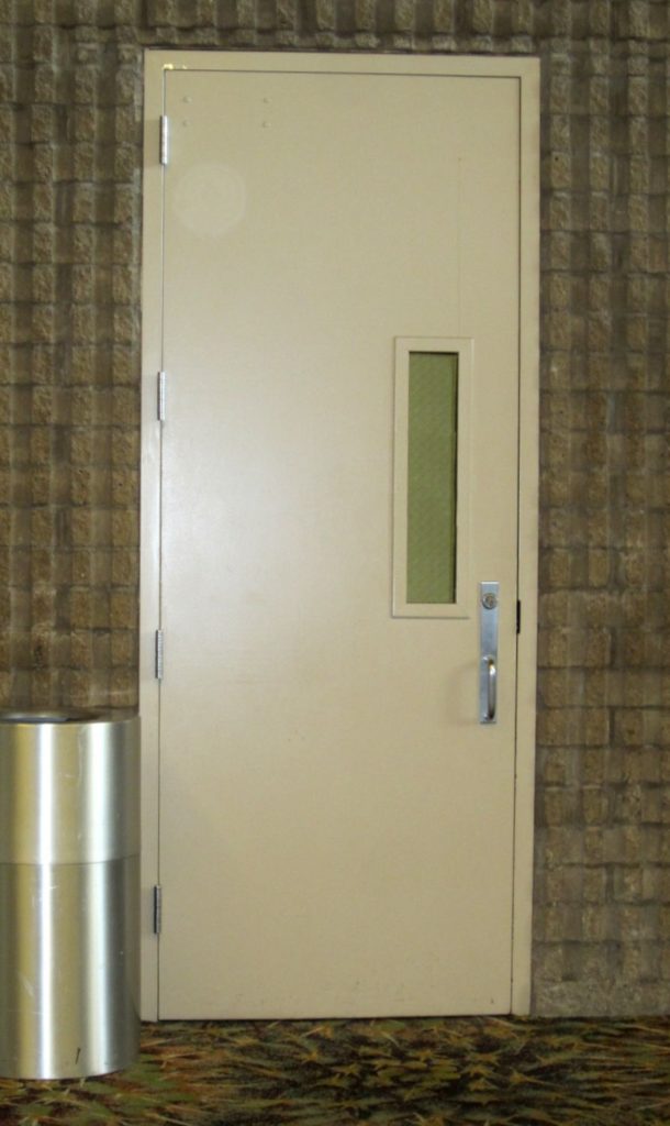 The accessibility standards do not require doors to have vision lights, although there are other code requirements that mandate vision lights in certain instances.  When a vision light is provided in a door or sidelight that is part of an accessible route, the light must be mounted at a height where it can be used by all building occupants - including those using a wheelchair.  If a door opening has multiple vision lights or sidelights, only one light must be located at the height prescribed by the accessibility standards.