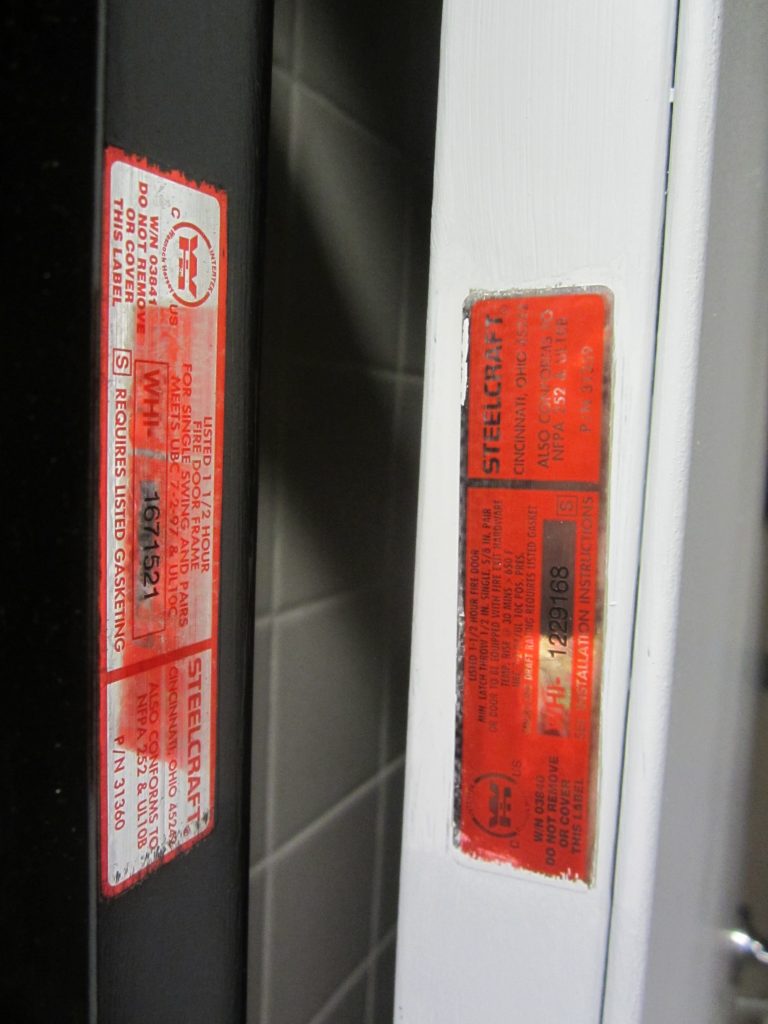 Extraneous labels on fire doors