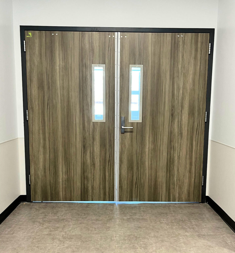 Are you aware of the current clearance requirements of NFPA 80, which allow up to 3/16-inch clearances on 20-minute fire doors in hollow metal frames?