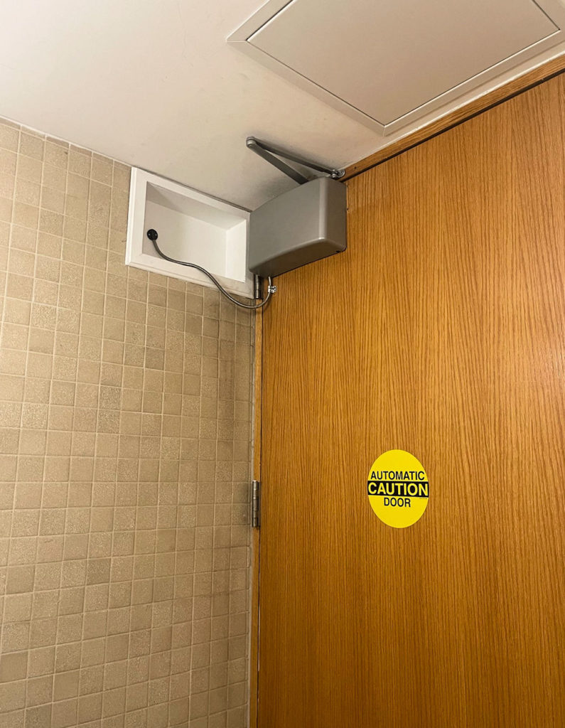 Greg Thomson of Allegion shared today's Fixed-it Friday photo of an accommodation made in the field for an LCN 6400 COMPACT series automatic operator.  I wonder at what point during the installation the problem was discovered.