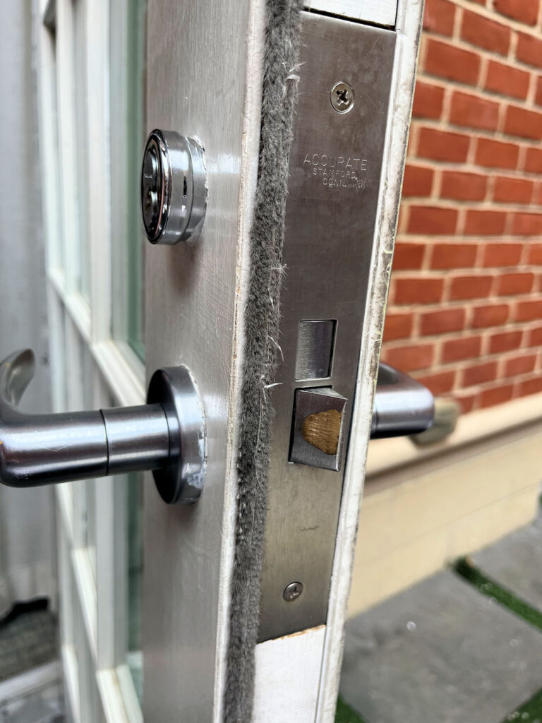 mortise locks on doorway to an enclosed courtyard
