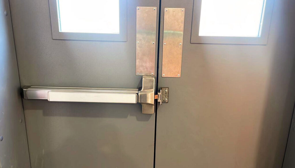 automatic flush bolt on one door, and strike on other