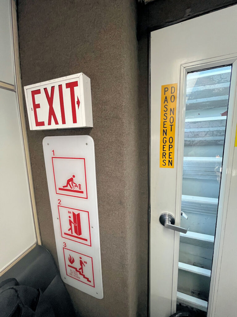 Confusing door operation instructions on egress door