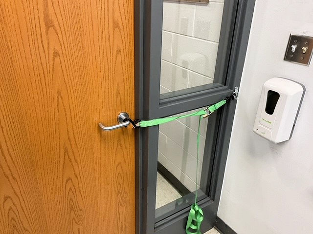 strap attached to door handle