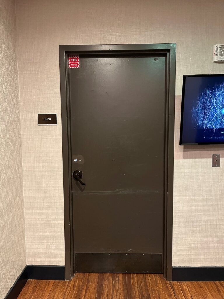 I saw the door in today's Wordless Wednesday photos during a recent hotel stay, and yes, it's definitely a fire door assembly, in an elevator lobby.