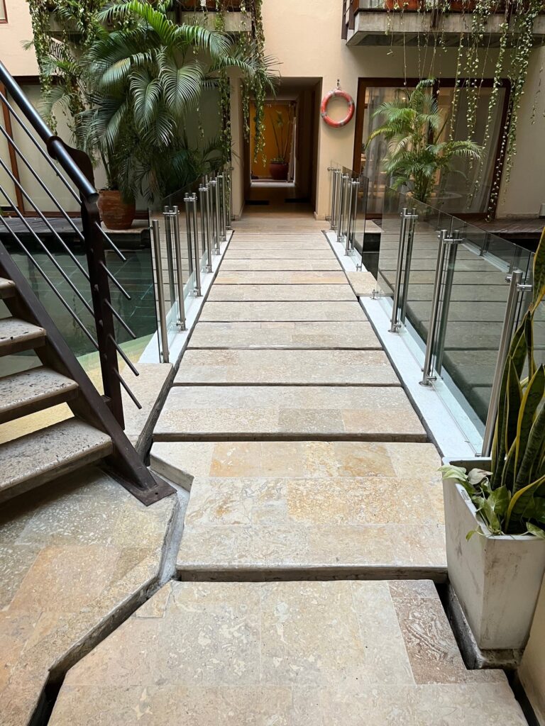 Although the photos in this post are not related to door hardware, there are some hardware products that require an opening in the floor - typically a hole in a strike plate.  WWYD?