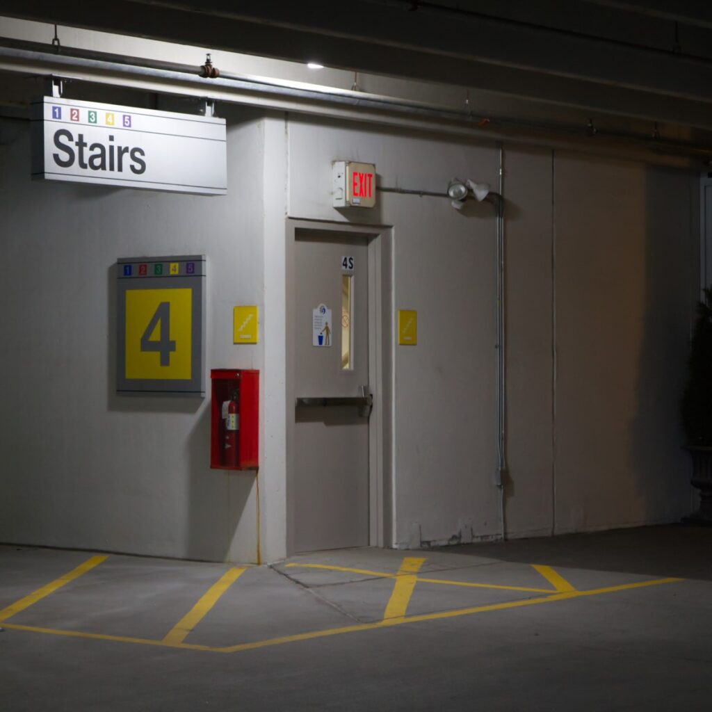 Today's Quick Question has come up many times in different forms:  On a multi-level parking garage with a capacity of 600 cars, do the stair doors and exit discharge doors require panic hardware?