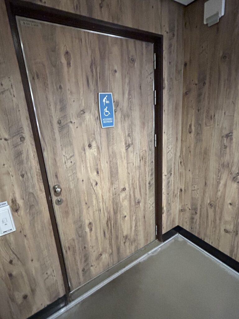 I received today's Fixed-it Friday photo from John Fuentes of Treanor Design, and we have a question for iDigHardware readers.  What's the reason for the atypical hinge locations on this cruise ship door?
