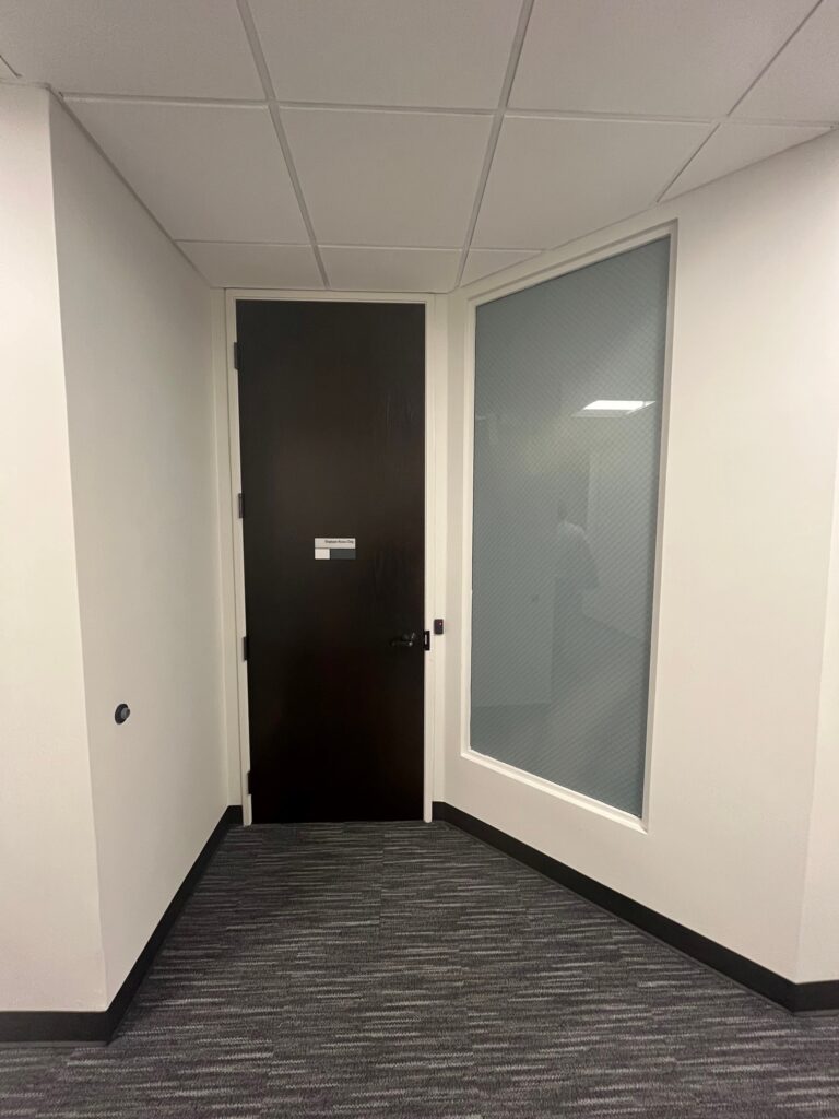 Last week I spent some time doing training in an office building, where I noticed these doors in the corridor leading to the office suites.  Does anyone see a code issue here?  WWYD?