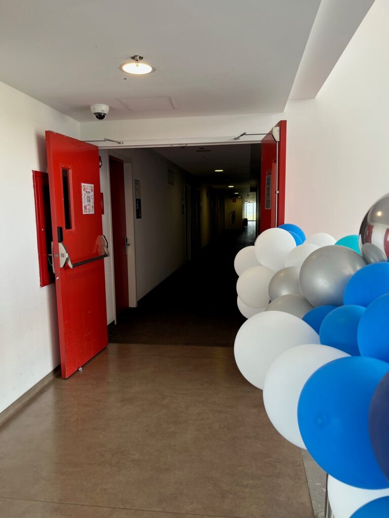 I took today's Wordless Wednesday photos on Move-In Day at college, where two of my kids live in the dorms.  The corridor fire doors stopped me in my tracks!