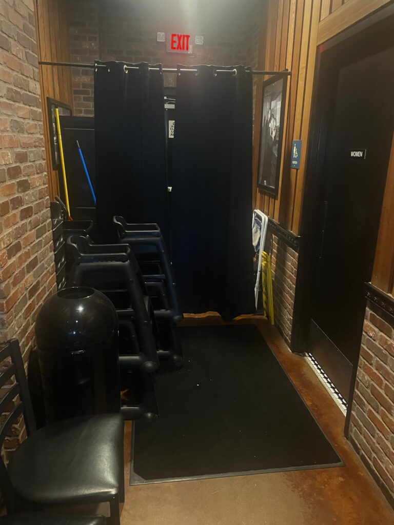 I received today's Wordless Wednesday photos from a retired AHJ, and they got me thinking.  Is it permissible for a means of egress to pass through curtains en route to the exit door?