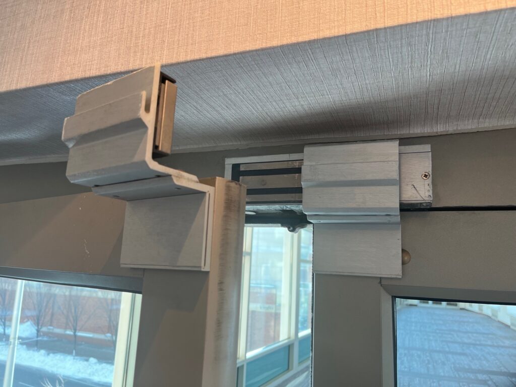 If one set of doors was lockable and the other was always unlocked (not lockable), I think this could be considered a dead end corridor. How would you have specified the hardware for these doors?