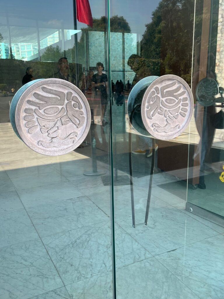 I saw today's Fixed-it Friday example on the main entrance of a museum in Mexico City.  The band goes around both pulls when the museum is closed.  Effective?