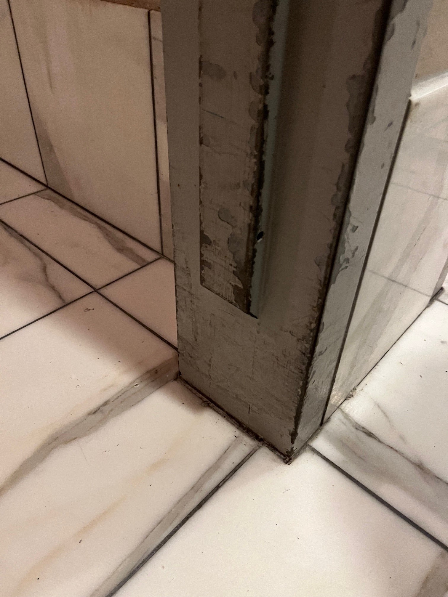 Terminated stop on a bathroom door