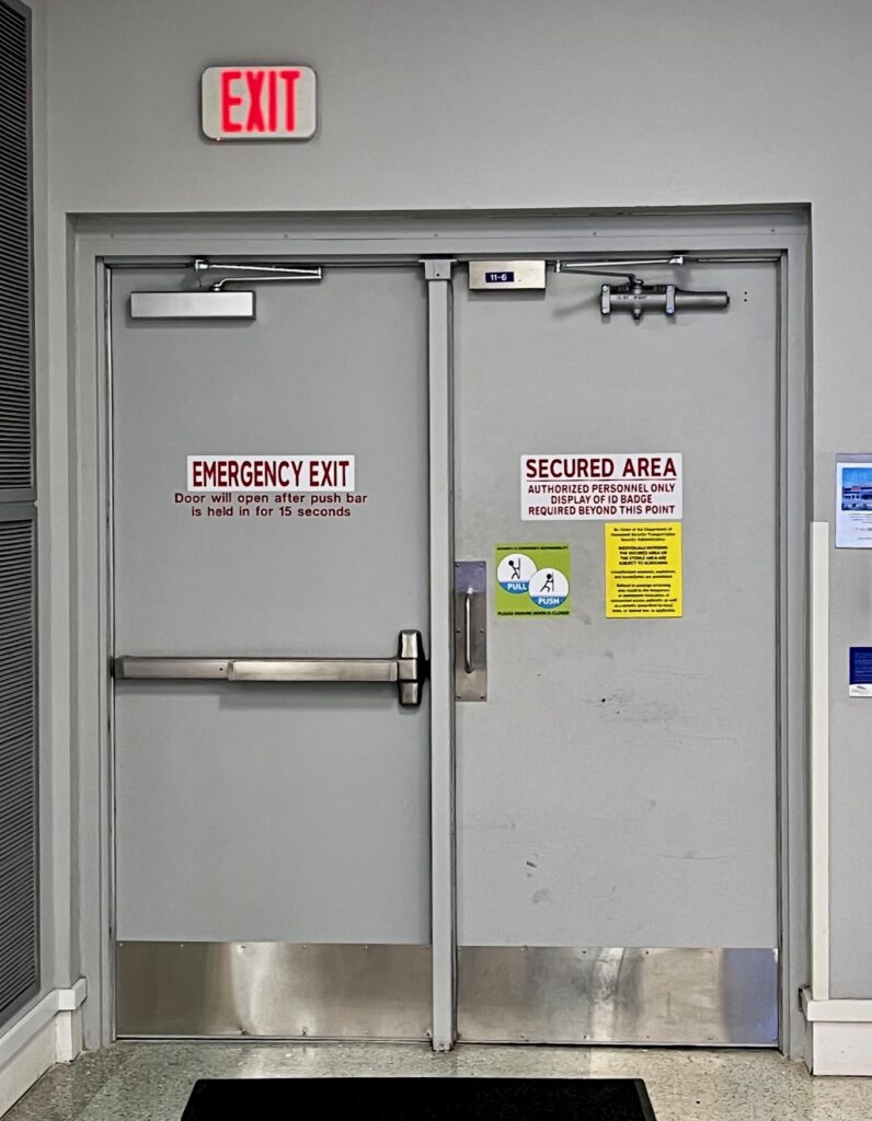 By the time this week is over I will have visited five airports - these are just two of the many doors I've seen so far.  What problems do you notice in these Wordless Wednesday photos?
