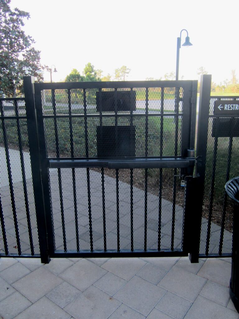 Are manually-operated swinging gates on accessible routes subject to the requirement for a flush, smooth surface on the push side, measured 10 inches up from the floor or ground?