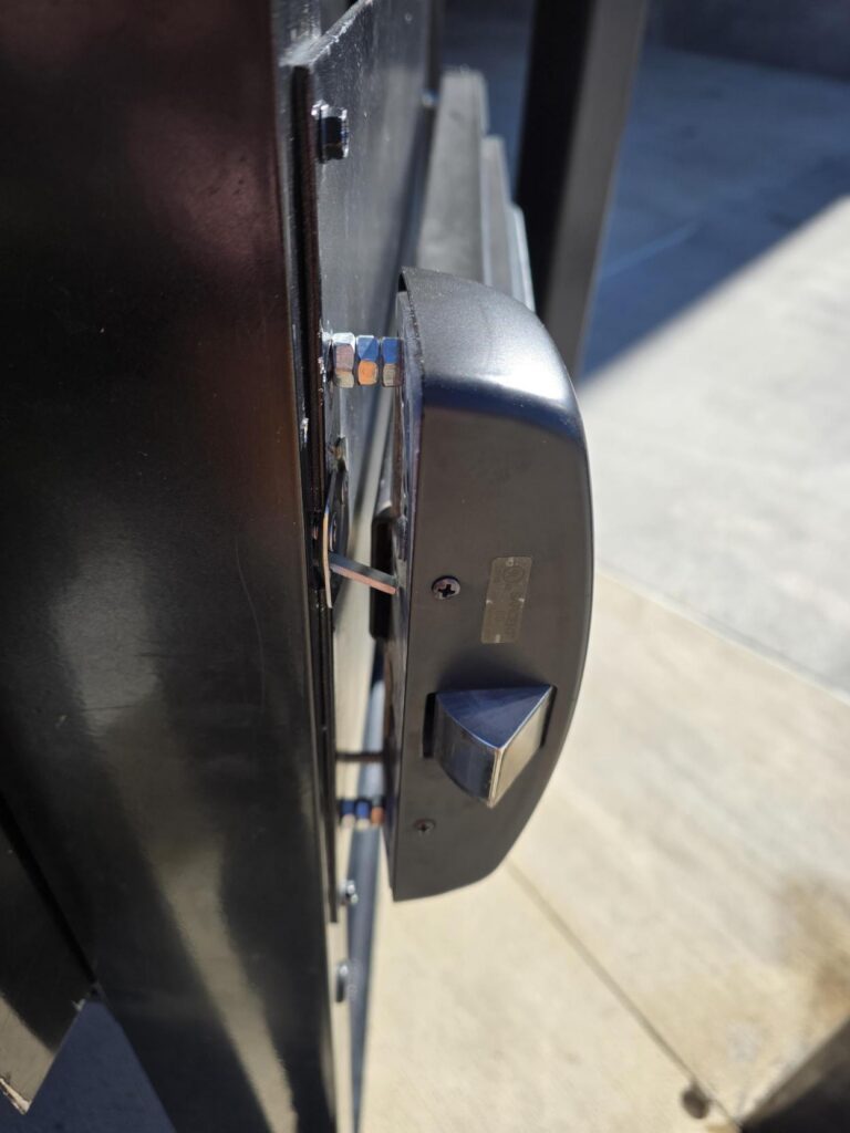 Steve Swertfeger of Isenhour Door sent me today's Wordless Wednesday photos of a loading dock door they were called to work on, and this is truly one of the worst panic hardware installations I've seen.
