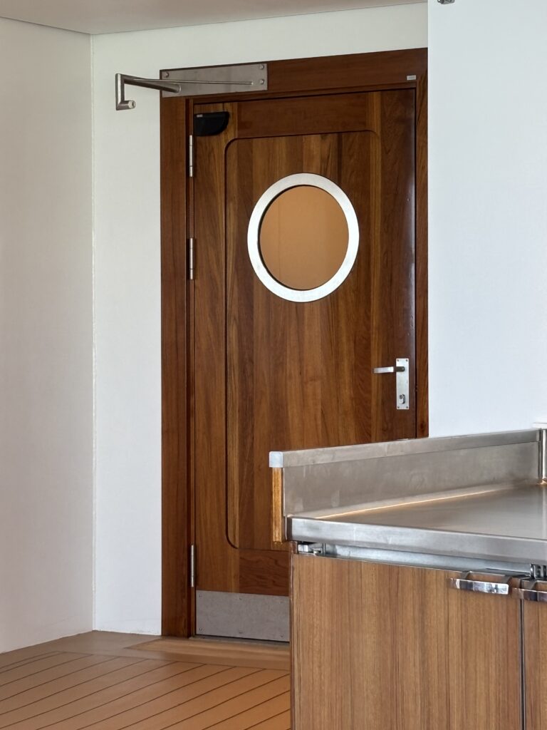 I received today's Fixed-it Friday photo from Paul Hawley of P.H. Hawley Associates - he saw this door on a cruise ship.  Although this is a stop and it's 