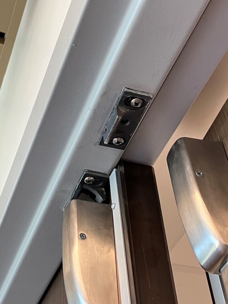 Apparently delayed egress leading through the maternity area of a hospital was not a popular choice - today's Fixed-it Friday photos are a great example of security vs. egress.