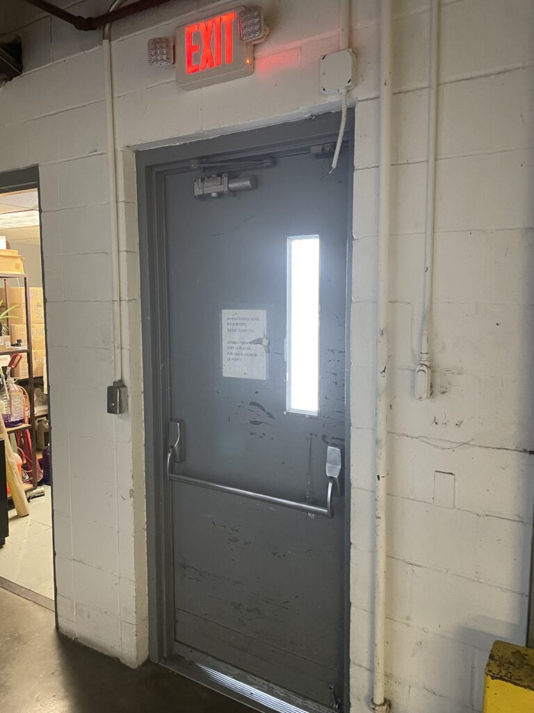 A retired fire marshal sent me today's Fixed-it Friday photos, which show yet another retrofit dogging method for panic hardware.  At least this one is probably not a fire door!